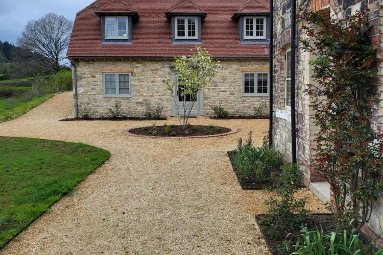 Wide paths and soft planting break up the space